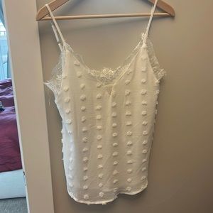 Gorgeous white tank with lace and textured Pom poms. New with tags.